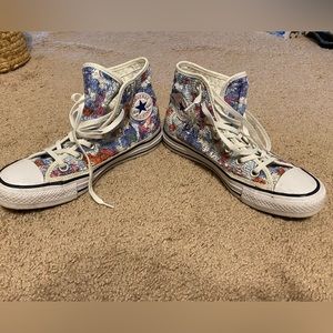 Womens Chuck Taylor high tops size6. With flowers and multi colors. Lightly worn